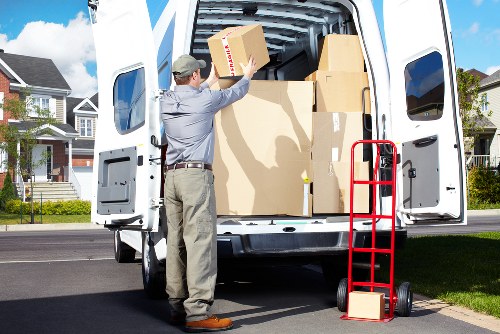Packed boxes and furniture prepared for short-term storage in Forestgate