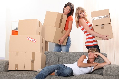 Packed boxes and furniture ready for a small move